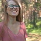 Woman enjoying summer day vacation in the forest park. - VideoHive Item for Sale