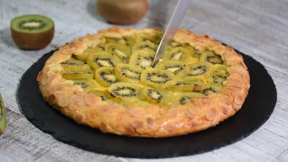 Open pie Galette with a kiwi