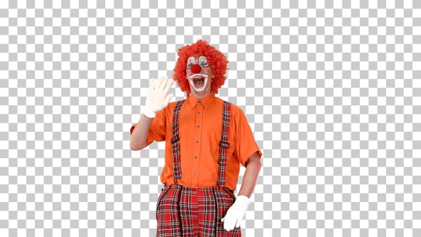 Clown in a red wig walking and greeting everyone, Alpha Channel