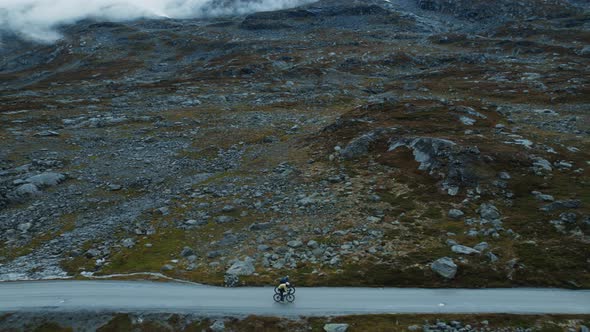 Side View Drone Shot of Cyclists Training on Road