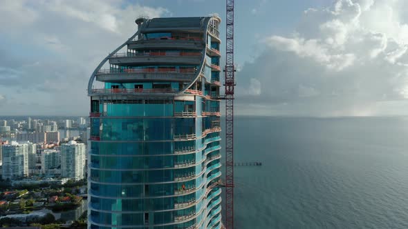  Aerial Building of the Skyscraper From Blue Glass with Scenic Ocean View. 