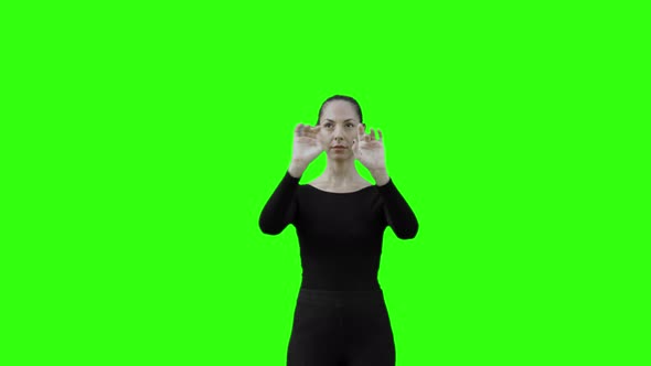 Woman Typing on a Virtual Keyboard: Typing, Swipe Right, Up and Down with Green Screen.