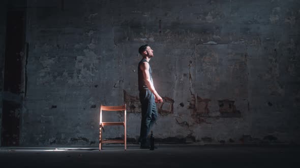 Man alone in a dark room