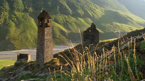Caucasus Mountains in Tusheti, Georgia. Ruins and the Old Tusheti Tower. Almost Dried Out Stream in