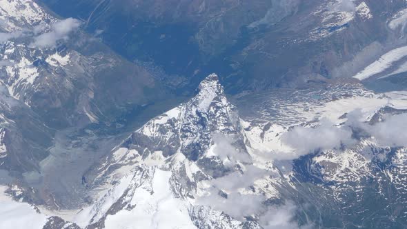 Aerial View of Snow Capped Matterhorn, Alps Summit Between Italy and Switzerland, Under Summer Sun