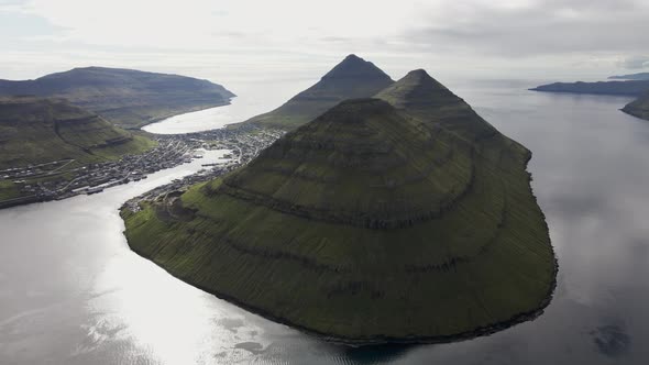 Drone Towards Klakkur Mountain With Klaksvik Town Below