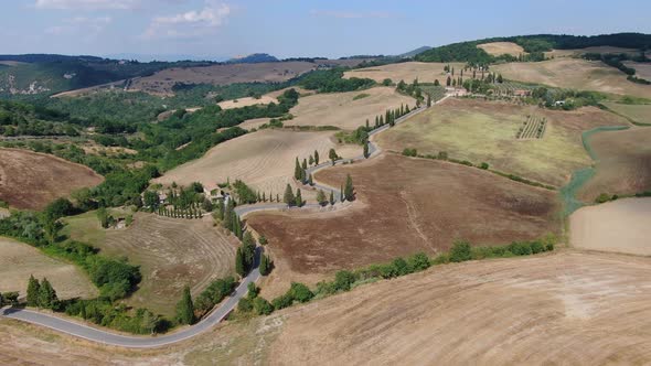 Aerial view of famous winding road near Monticchiello, Tuscany, Italy, Europe