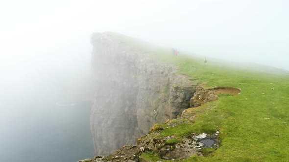 Beautiful View of Foggy Traelanipan Slave Mountain in Vagar Faroe Islands