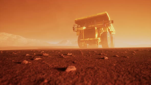 Big Yellow Mining Truck in the Dust at Career