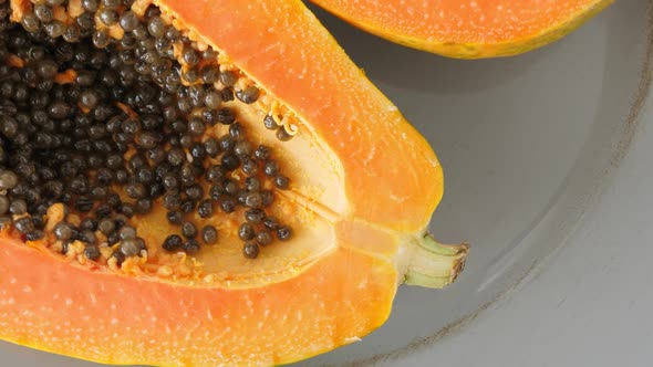 Top View of Ripe Half Cut Papaya, Healthy Summer Food Concept with Tropical Fruits, Flat Lay