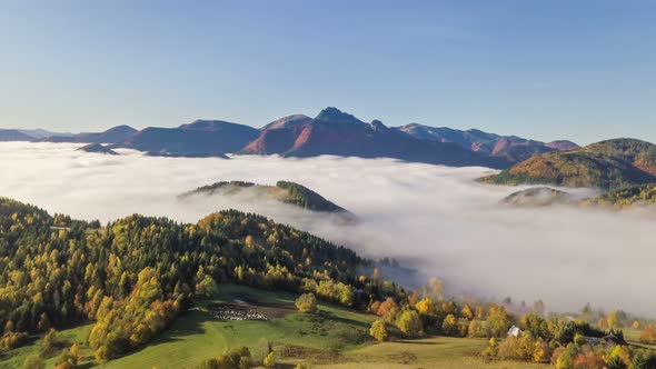 Aerial Foggy Autumn Mountains Landscape in Alpine Nature at Sunny Morning