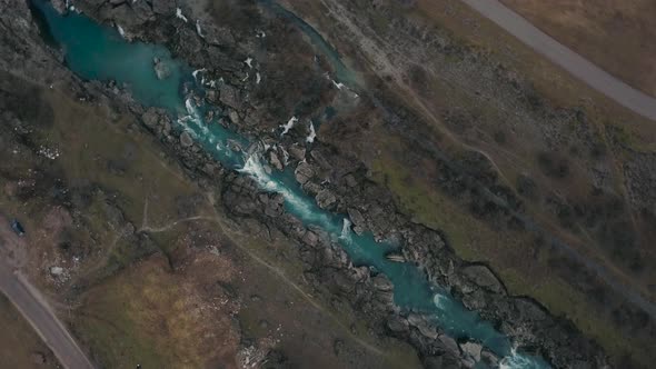 Aerial view of Niagara Waterfall on the river Cijevna on cloudy weather in Podgorica, Montenegro