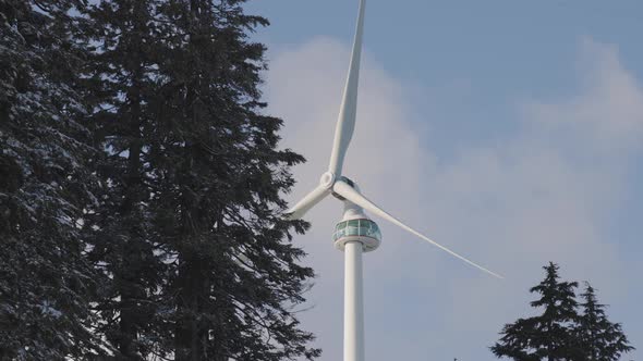 Wind Turbine on Top of Grouse Mountain During Cloudy Winter Season