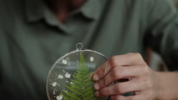 Woman Fixes Glass Plates