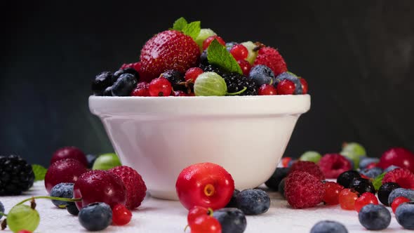 Mix of Wild Berries on Black Background  UHD Video Footage