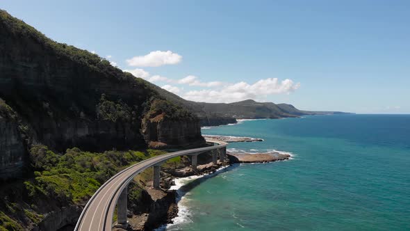 Aerial View. Beautiful Scene with an Estokad, Rock and Ocean. The Road Runs Along the Shore.