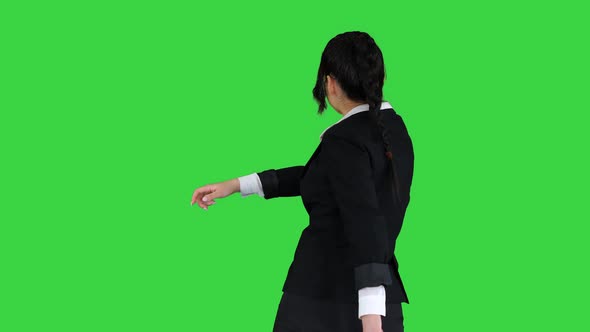 Adorable Confident Young Business Woman Dancing on a Green Screen, Chroma Key