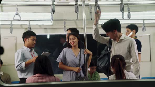 Crowd of People on a Busy Crowded Public Subway Train Travel