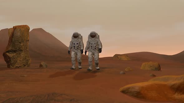 Two Astronauts  Walking On The Surface Of Mars. alt