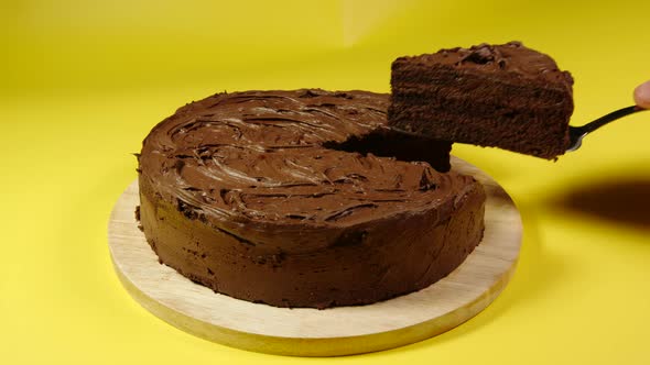 Man's Hand Picks Up Piece Of Cake