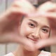 Asian young beauty woman make heart shape hand gesture. - VideoHive Item for Sale