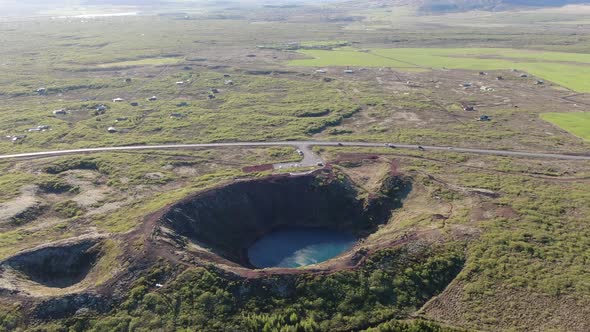 Flying over Kerid volcanic crater near Selfoss city in Iceland, Europe