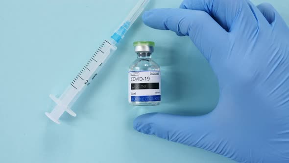 Covid19 Coronavirus Vaccine Doctor's Takes Ampoule in Hand New Medication Developing Vaccination