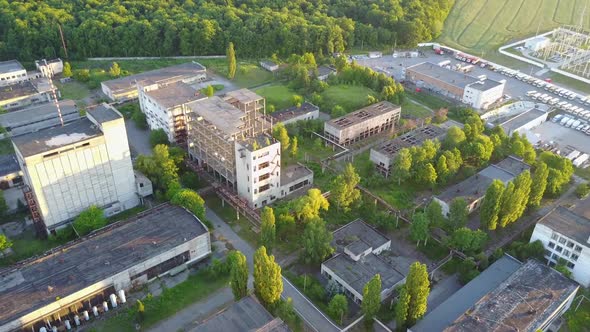 Factory With Broken Windows. Aerial view of an old factory ruin and broken windows