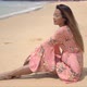 Barefoot Ethnic Woman Sitting on Beach - VideoHive Item for Sale