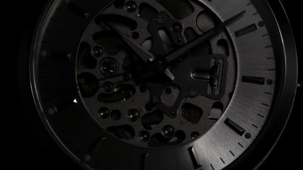 Watch with Open Mechanism Rotating with Light