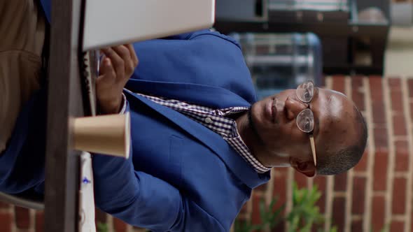 Vertical Video Happy Businessman Celebrating Project Success in Startup Office