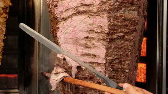 Shawarma Meat Being Cut Before Making Traditional Turkish Doner Kebab in Turkey