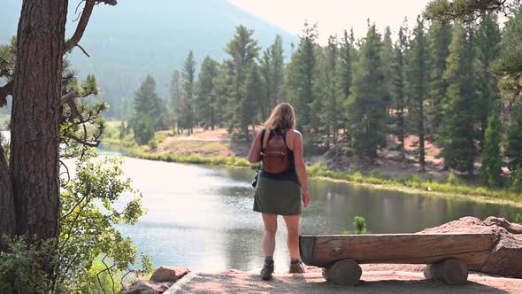 Woman taking photo at Lily Lake