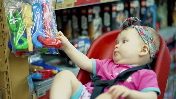 Child Sits in a Specially Equipped Chair 14