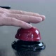 A man's hand rings a bell at the front desk. - VideoHive Item for Sale