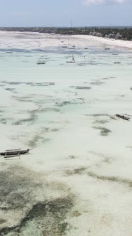 Vertical Video of Low Tide in the Ocean Near the Coast of Zanzibar Tanzania