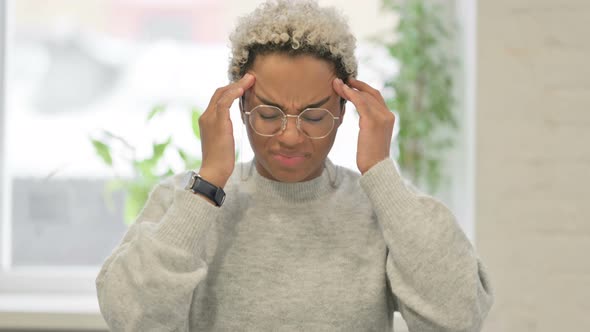 Portrait of African Woman Having Headache