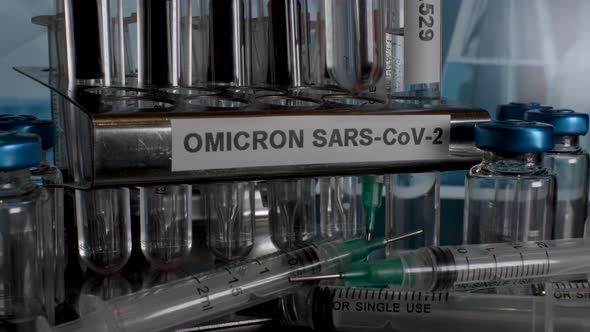 Omicron SARS-CoV-2 Test Tube Vials Being Placed Into Rack. Close Up, Static Shot