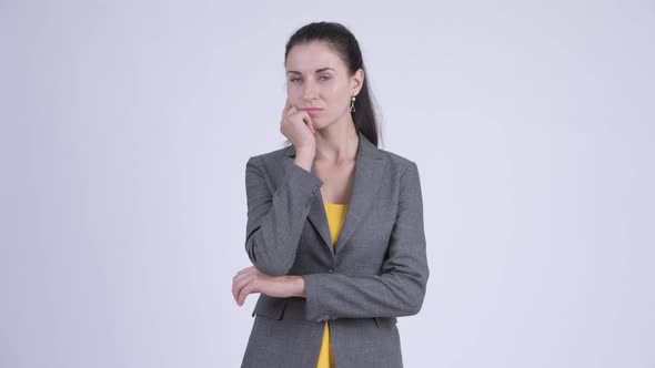 Young Beautiful Businesswoman Thinking