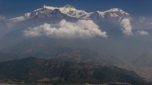 Clouds Form Below The Top Of Annapurna South