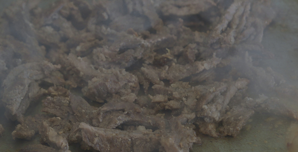 Beef Pieces On Grill alt