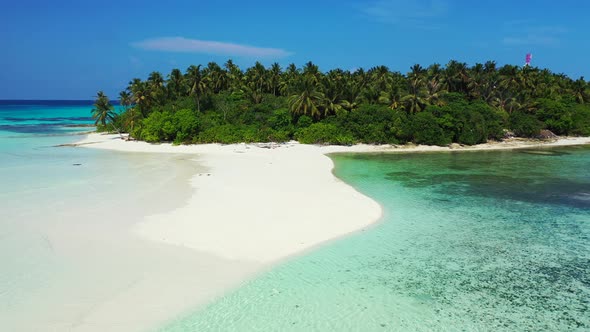 Luxury aerial clean view of a sunshine white sandy paradise beach and blue ocean background in 4K