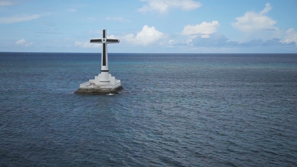 Catholic Cross In The Sea.