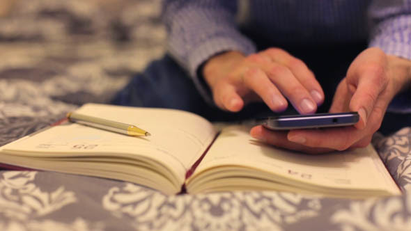 Man Settles on the Phone alt