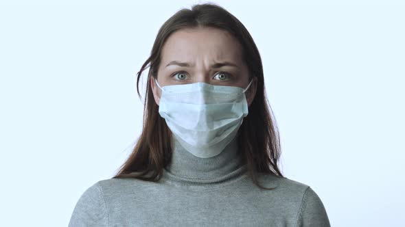 Girl in Medical Mask Nervously Breathes, Moves Eyes Panic of Epidemic Covid-2019