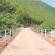 Bridge Over Beautiful Mountain Lake on a Sunny Day - VideoHive Item for Sale
