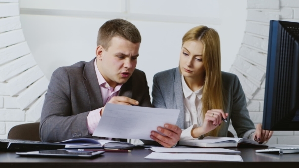 Business Woman And Man Working In The Office