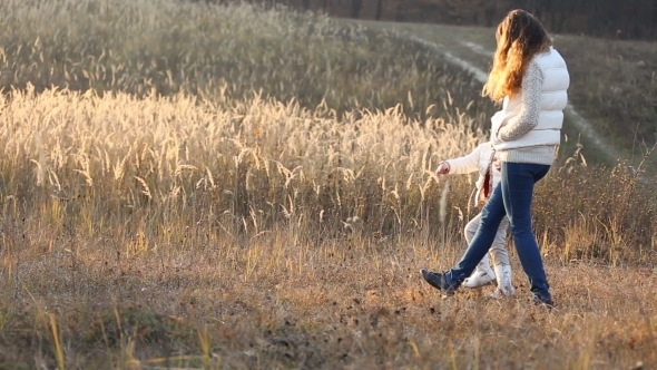 Mom And Daughter Walk