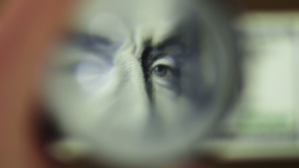 One Hundred Dollars Under The Magnifying Glass