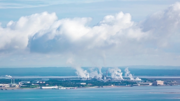 Industrial Landscape With Steaming Pipes